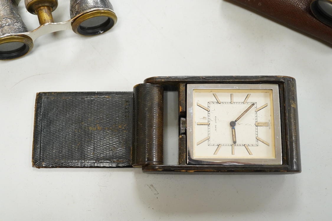 A Le Coultre desk timepiece, and four pairs of opera glasses